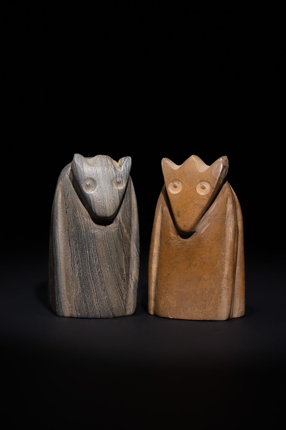 Lot 149: A PAIR OF ISLAMIC STONE CHESS KNIGHTS, 20TH CENTURY.