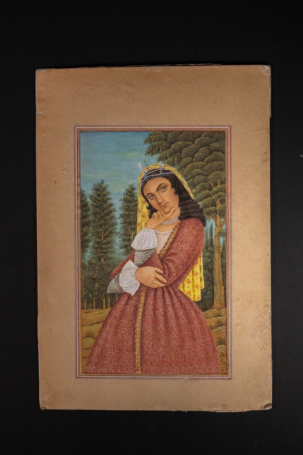 Lot 153: A QAJAR PORTRAIT OF A YOUNG WOMAN BY MOHAMMAD ISMA'IL NAQASHBASHI, PERSIA, 19TH CENTURY.
