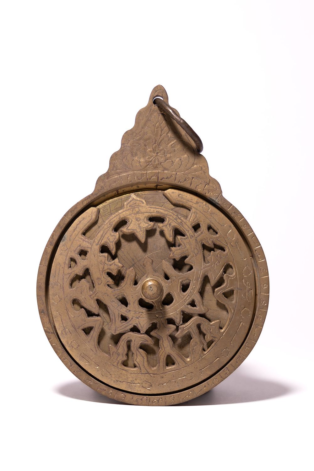 Lot 157: AN ISLAMIC HANGING BRASS ARABIC ASTROLABE.