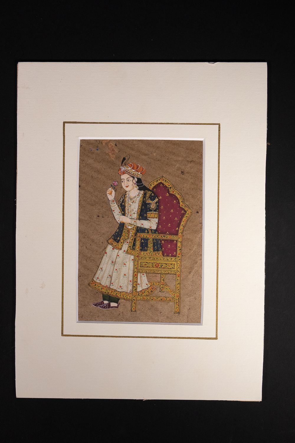 Lot 158: A QAJAR PORTRAIT MINIATURE OF A SEATED NOBLEMAN, PERSIA, 19TH CENTURY.