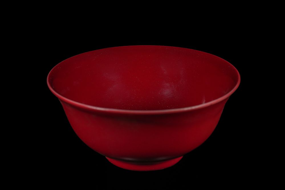 Lot 238: A CHINESE MONOCHROME RED-GLAZED PORCELAIN BOWL, YONGZHENG MARK.
