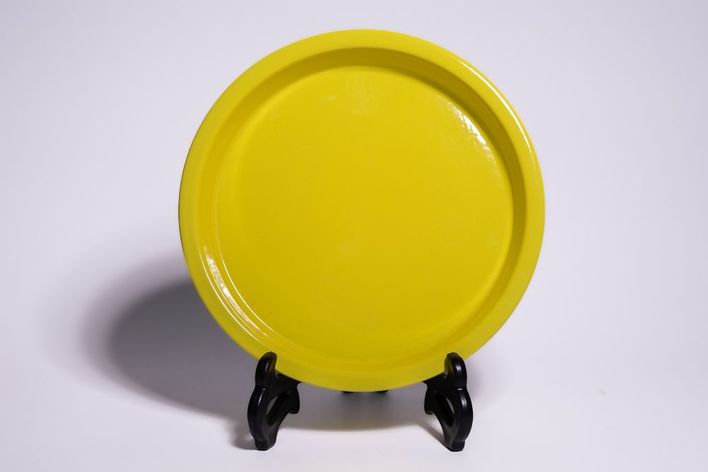 Lot 302: A CHINESE MONOCHROME YELLOW-GLAZED PORCELAIN DISH, YONGZHENG MARK.
