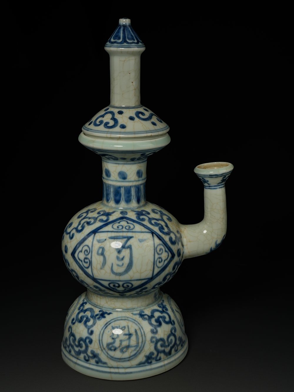 Lot 315: A CHINESE BLUE AND WHITE PORCELAIN RITUAL WATER VESSEL, 'SANSKRIT' RITUAL KUNDIKA AND COVER.