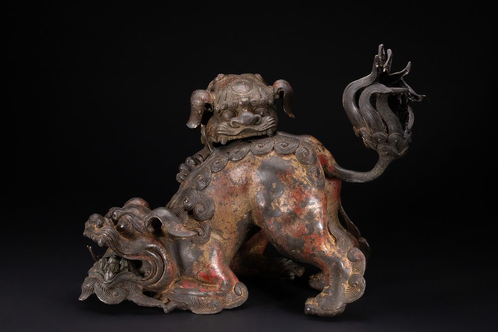 Lot 319: A CHINESE GILT-BRONZE AND POLYCHROME LION AND CUB INCENSE BURNER.