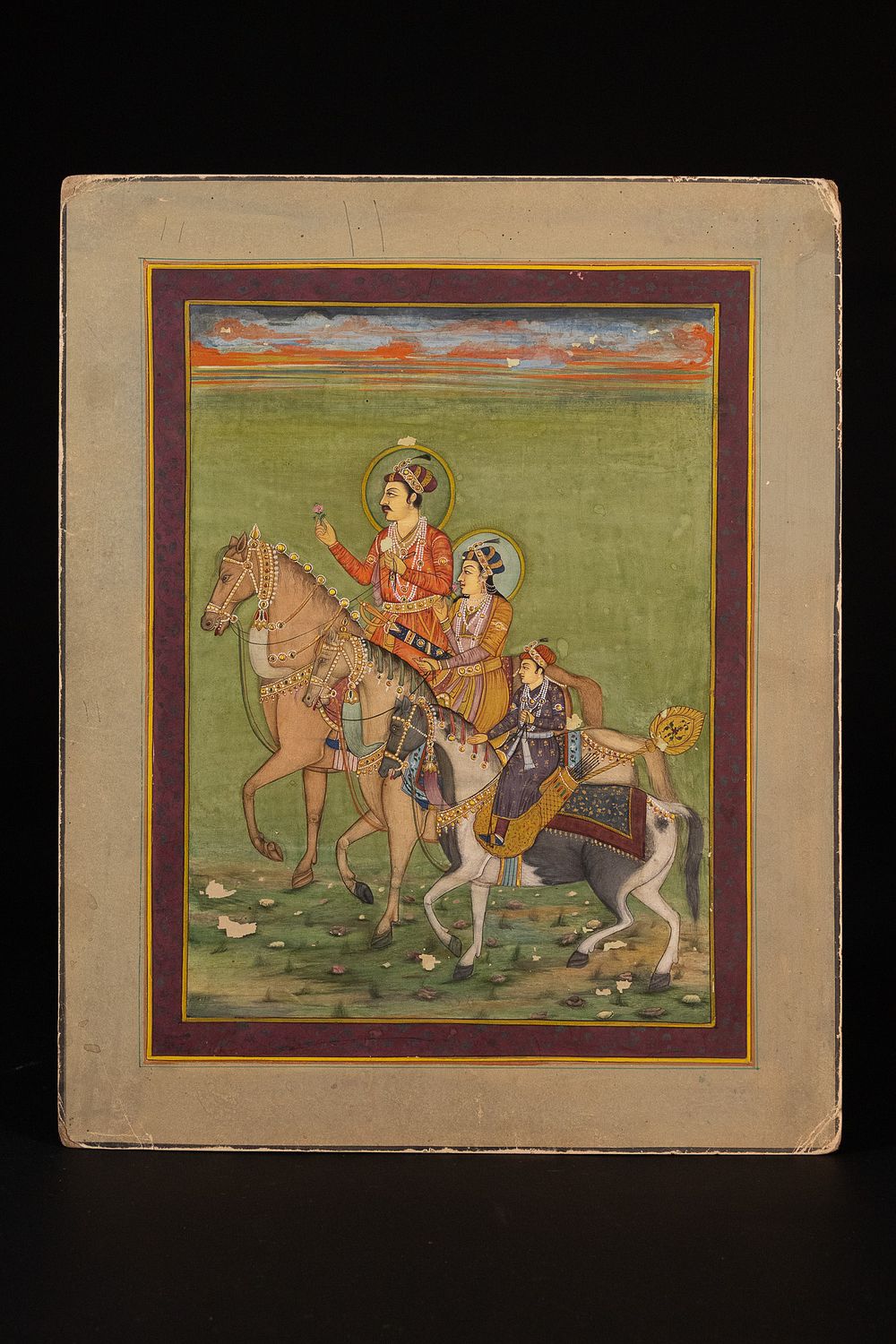 Lot 332: AN INDIAN MINIATURE PAINTING OF A ROYAL PROCESSION ON HORSEBACK, 19TH CENTURY.