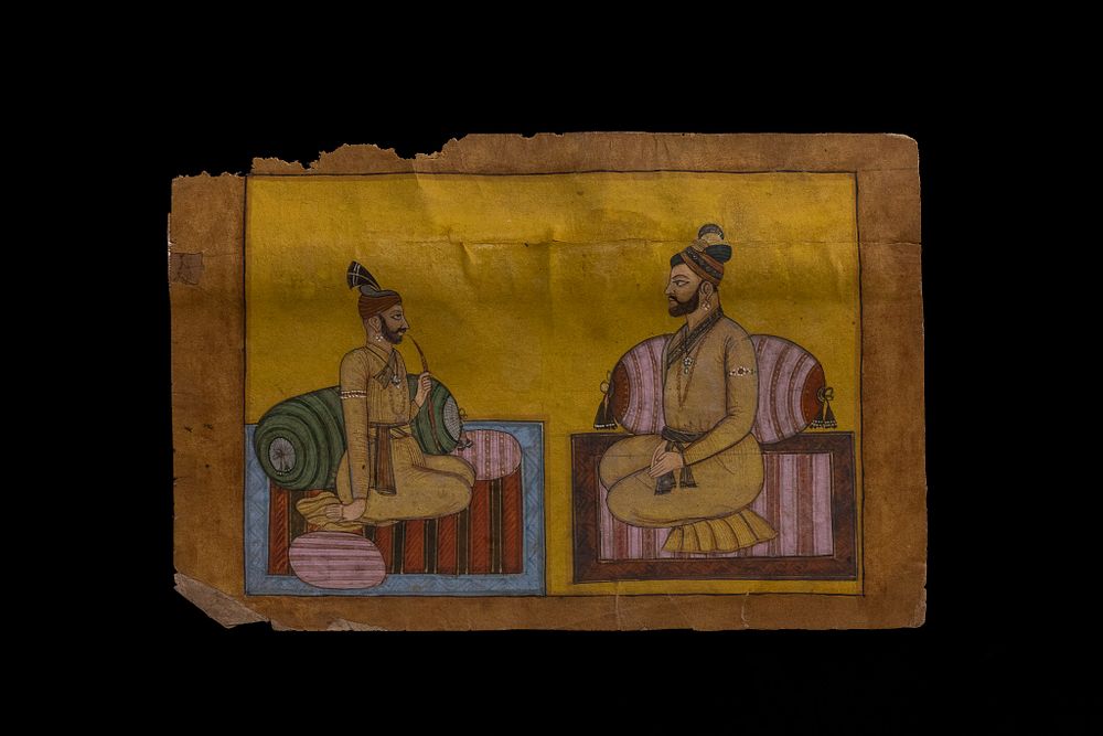 Lot 356: AN INDIAN MUGHAL MINIATURE PAINTING OF TWO NOBLEMEN IN CONVERSATION, 19TH-20TH CENTURY.