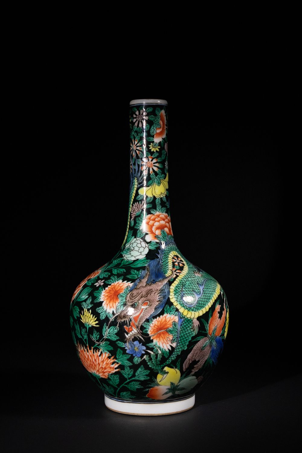 Lot 360: A CHINESE WUCAI PORCELAIN DRAGON FLOWER BOTTLE VASE, KANGXI MARK.