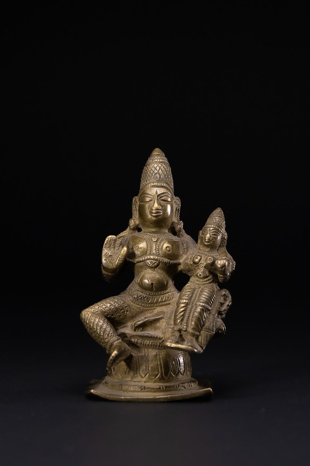 Lot 391: A SOUTHERN INDIAN BRONZE FIGURE OF UMA-MAHESHVARA, 18TH/19TH CENTURY.