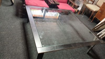 Large Coffee Table Made From Steel with a Glass Top. Stylish and contemporary furniture piece 