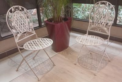 A Pair of White Round Metal Floral Designed Folding Outdoor Garden Patio Chairs. Beautifully 