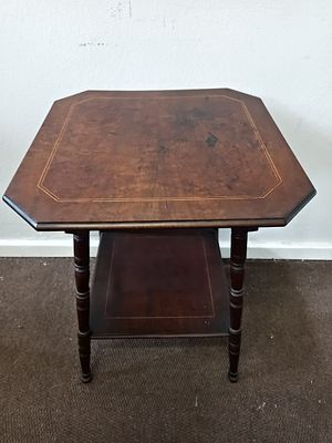 Antique Victorian Two Tear Side Table. This antique table is an elegant and compact piece 