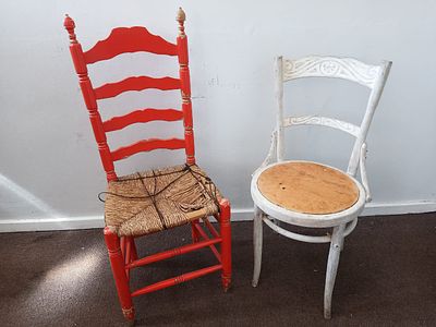 Two Vintage Chairs . Orange Wicker Chair: This vintage chair features a vibrant orange color and 