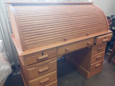 Solid Oak Roll Top Desk - Good Condition. A perfect blend of functionality and classic design. 