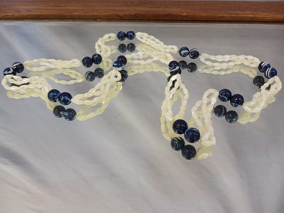 Vintage Mother-of-Pearl and Blue Glass Beaded Necklace. This vintage necklace features three