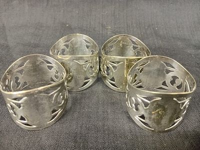 Set of 4 Silver Plated Napkin Rings. A refined set of four silver plated napkin rings, each