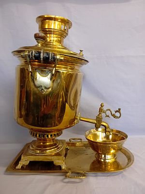 Antique Russian Brass Samovar. This antique Russian brass samovar is accompanied by its matching