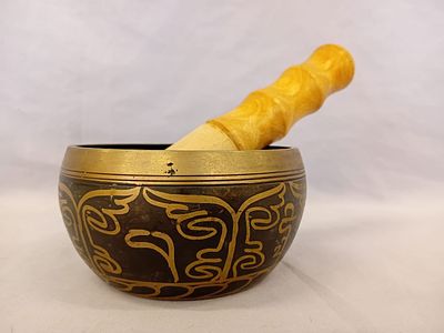 Tibetan Singing Bowl . A traditional bronze bowl, used for meditation, healing, and sound
