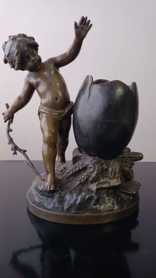 L. Moreau (1855-1919) - Bronze by L Moreau Depicting a Boy Alongside a Giant Egg . The bronze