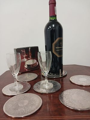 7 Piece Coaster Set - Silver Plated. This elegant collection includes six beautifully crafted 