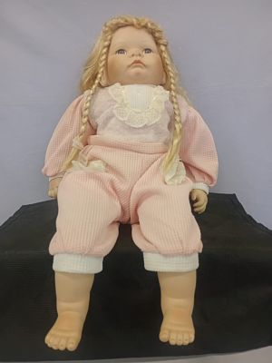 Large Sitting Baby Doll. This large baby doll measures 53 cm from head to toe, with a 10 cm wide 