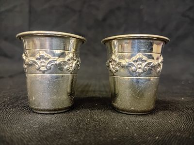 Two 925 Silver Kiddush Cups. A pair of 925 sterling silver Kiddush cups, each adorned with an 