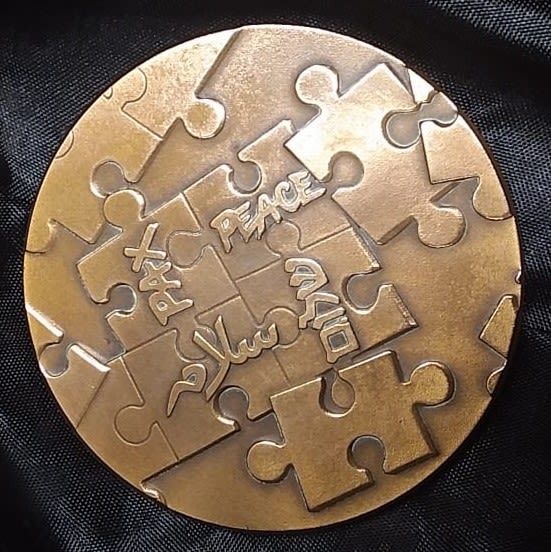 Israeli 1991 Madrid Peace Conference Bronze Medal. Peace in 4 different languages on one side. 