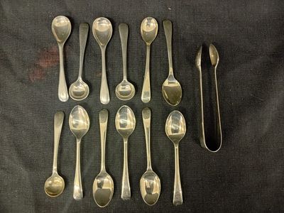 Collection of Rustless Nickel Silver . This elegant collection features 12 finely crafted tea 