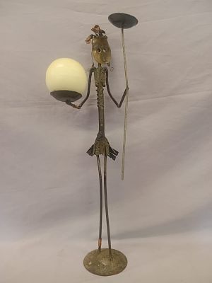 African Lady Metal Sculpture Candle Holder. A 53cm tall decorative metal sculpture. The figure 