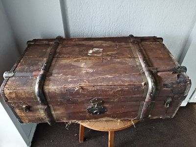 Large Antique Travel Suit Case/Steamer Trunk. Wooden travel suitcase with visible wear from age 