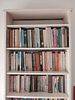 Tall Bookshelf with Books. Add character and practicality to any room with this tall bookshelf Image - 1