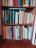 Tall Wood Finished Bookshelf with Books. Add character and practicality to any room with this Image - 2