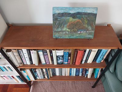 Mid-Century Bookshelf with Books & Painting . Add character and practicality to any room with 