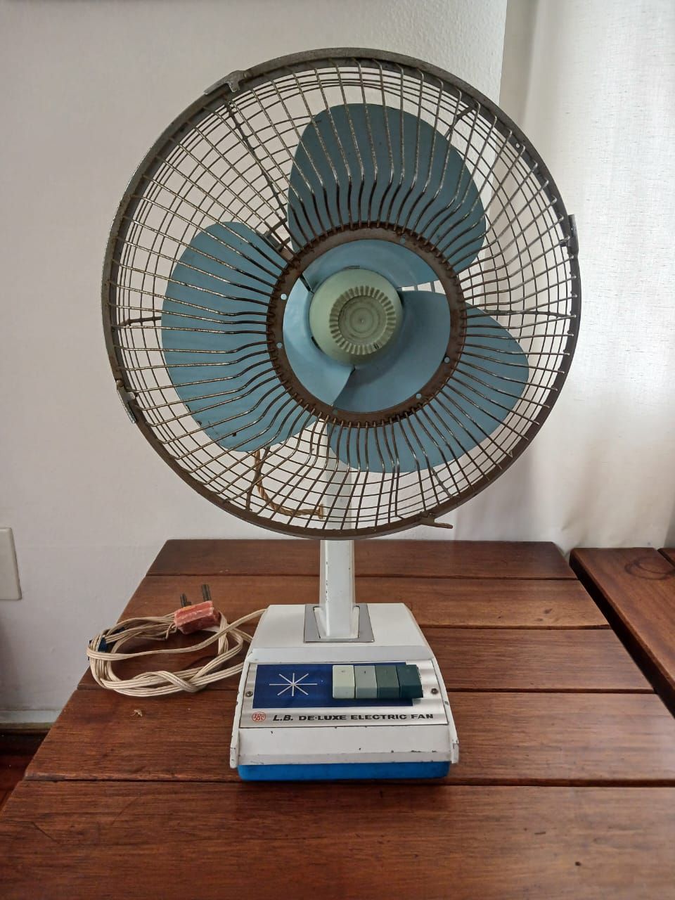 Table Fan. Classic and functional, this vintage table fan adds retro charm to any room while 