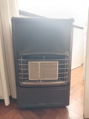Gas Heater with Cylinder. Stay warm and cozy with this practical gas heater, complete with a 