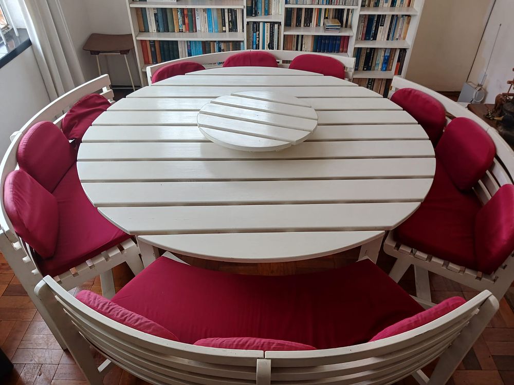 Curved Bench Dining Table Set. Entertain in style with this elegant curved bench dining table 