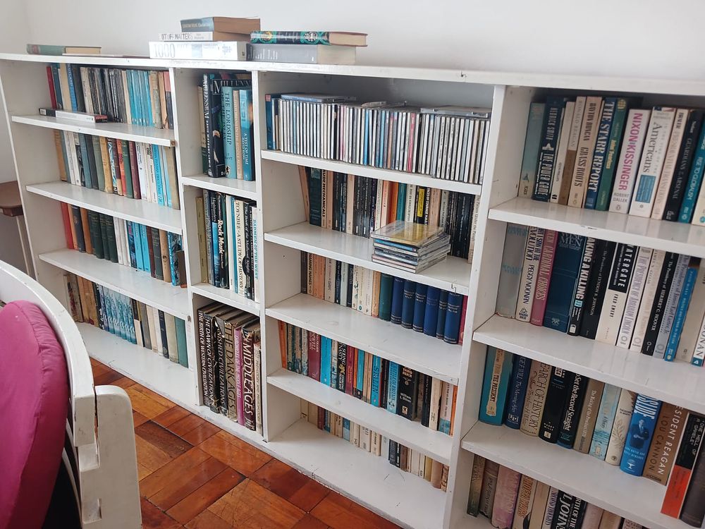 Bookshelf with books. This practical bookshelf comes complete with a curated selection of books 