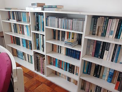 Bookshelf with books. This practical bookshelf comes complete with a curated selection of books 
