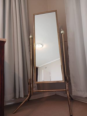 Brass Stand Cheval Mirror. Elegant brass cheval mirror with freestanding design, perfect for 