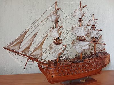 Handcrafted Wooden HMS Victory Model Ship – Detailed Replica with Cotton Sails & Metal Fittings. 