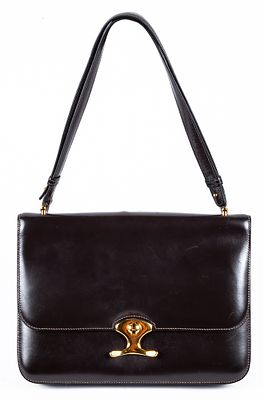 A vintage Herm&egrave;s "Volta" handbag in black leather with gilt metal fittings 900 - 1.200 €