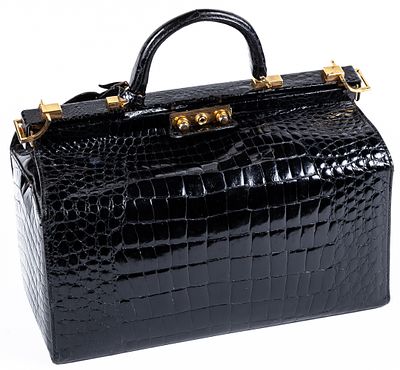 LOEWE. A travel toiletry pouch crafted from exquisite crocodile skin 900 - 1.200 €