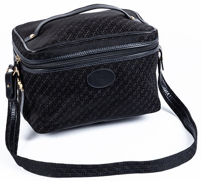 LOEWE. A vintage 1970s travel toiletry pouch in leather and black Monogram canvas 150 - 250 €