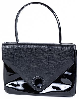 LOEWE. A black leather and patent leather bag with original dust bag 250 - 300 €