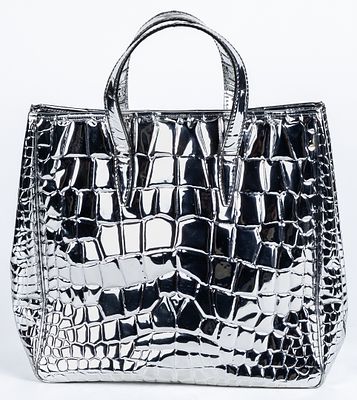 YVES SAINT LAURENT. A tote bag in metallic-effect leather and patent leather with 