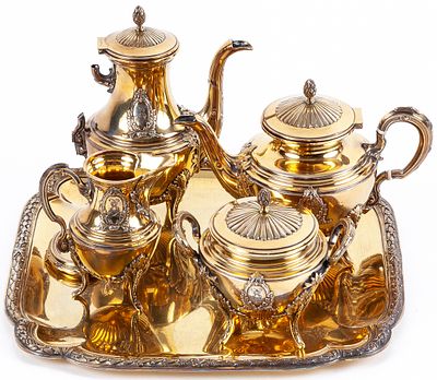 A French vermeil silver coffee and tea set. Handle of the coffee pot detached 18 cm, coffee pot 