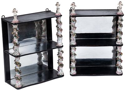 A pair of small ebonized-wood shelves with Meissen porcelain Salomonic columns 36,5 x 12 x 25 