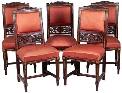 A set of ten Empire style bronze and mahogany dining chairs with openwork backs. Damages 105 x 