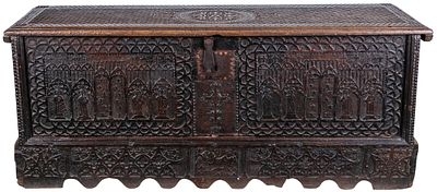 A Basque carved chestnut chest with Gothic motifs and figures of saints. Central cross under 