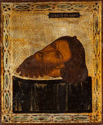 A Russian icon “Head of Saint John the Baptist,” painted in tempera on panel, 19th century 28 x 