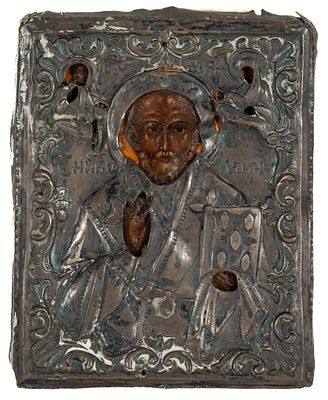 Russian icon "Saint Nicholas” painted in tempera on panel with embossed silver sheet, 19th 